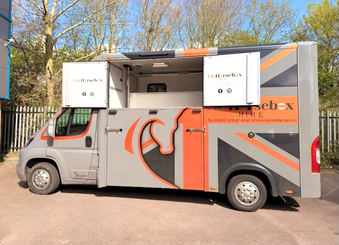 LS Horsebox Hire custom built 3.5T horsebox parked by a paddock fence